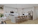 Modern kitchen featuring white cabinets and a spacious island at 105 Mayfair Ct, Summerville, SC 29485