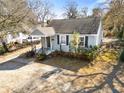 Cute gray house with yard and driveway at 1343 E Montague Ave, North Charleston, SC 29405