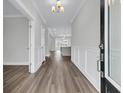 Bright entryway with hardwood floors and white wainscoting at 3725 Grange Cir, Summerville, SC 29486