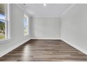 Spacious office with hardwood floors and large windows at 3725 Grange Cir, Summerville, SC 29486