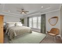 Spacious bedroom with a king-size bed and large windows at 482 Hidden Meadow Ln, Summerville, SC 29486