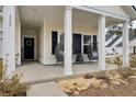 Front porch with seating area, inviting entryway at 117 Upper Trestles Ave, Summerville, SC 29483