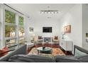 Bright living room with hardwood floors and ample natural light at 21 George St # 114, Charleston, SC 29401