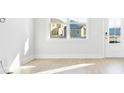 Bright living room with hardwood floors and large windows at 219 Terrace View Dr, Summerville, SC 29486