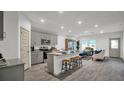 Open concept kitchen with gray cabinets, granite counters, and island at 221 Terrace View Dr, Summerville, SC 29486