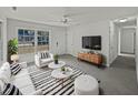 Bright living room with comfy seating and modern TV at 2476 Lantern St, Charleston, SC 29414