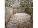 Small fenced backyard with a patio area at 292 Fleming Rd # C, Charleston, SC 29412