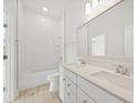 Clean and modern bathroom with white subway tile, double vanity, and a bathtub at 349 Trailmore Ln, Summerville, SC 29486