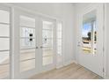 View of the home's exterior from the entryway, showing natural light at 349 Trailmore Ln, Summerville, SC 29486