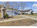 Charming home featuring a well-manicured lawn and a welcoming facade at 1904 Iris St, North Charleston, SC 29405