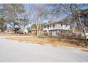 Two-story house with brick and siding, attached garage, and a landscaped yard at 210 Drexel Rd, Ladson, SC 29456