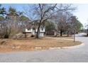 Two-story house with brick and siding, attached garage, and a landscaped yard at 210 Drexel Rd, Ladson, SC 29456