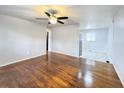 Inviting living area with hardwood floors, neutral walls, and an open layout leading to other rooms at 227 Bailey St, Walterboro, SC 29488