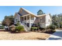 Attractive two-story house with landscaped yard and driveway at 2517 Charter Oaks Dr, Mount Pleasant, SC 29466