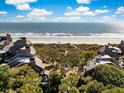 Aerial view of beachfront community; highlighting the pathway to beach access at 4416 Sea Forest Dr, Kiawah Island, SC 29455