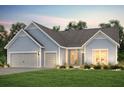 Charming single-Gathering home features a 2-car garage, blue siding, a gray roof, and a well-manicured lawn at 2094 Cousteau Ct, Johns Island, SC 29455