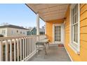 Cozy porch with table and chairs, perfect for enjoying the outdoors at 234 Rutledge Ave # D, Charleston, SC 29403