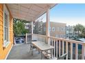 Spacious porch with furniture and neighborhood view at 234 Rutledge Ave # D, Charleston, SC 29403