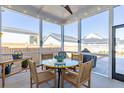 Cozy screened porch with seating, offering a relaxing outdoor space at 332 Clearpath Dr, Summerville, SC 29486