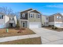 Attractive home with neutral-colored siding and a well-manicured lawn at 9747 Roseberry Street, Ladson, SC 29456