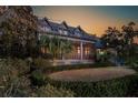 Expansive screened porch and balcony area in a professionally landscaped private yard at 15 Watroo Pt, Daniel Island, SC 29492