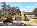 New two-story house with a pond in the backyard at 2982 Lodge Berry Ln, Johns Island, SC 29455