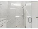 Sleek bathroom featuring a glass-enclosed shower with marble tile at 1030 Sagegrass St, Summerville, SC 29485