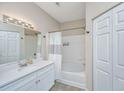 Bright bathroom featuring a tub and shower combo, and ample storage at 60 Fenwick Hall Allee # 234, Johns Island, SC 29455
