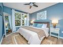 Cozy bedroom with a large window, stylish decor, and serene color palette at 60 Fenwick Hall Allee # 234, Johns Island, SC 29455