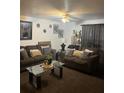 Spacious living room with a ceiling fan, providing comfortable seating and a welcoming atmosphere at 527 Travelers Blvd, Summerville, SC 29485