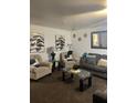 Cozy living room with stylish decor, comfortable seating, and a modern glass coffee table at 527 Travelers Blvd, Summerville, SC 29485