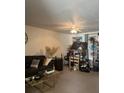 Cozy living room area featuring a plush sofa, decorative lighting, and entertainment setup at 531 Travelers Blvd, Summerville, SC 29485