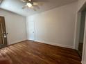 This bright living room features wood-look floors, neutral walls, and ample natural light at 103 Cooper St, Charleston, SC 29403