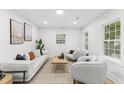 Inviting living room with stylish decor, comfortable seating, and ample natural light at 1112 Melvin Dr, Hanahan, SC 29410