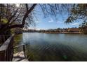 Peaceful lake view from a private dock featuring calm waters and distant homes at 210 Lakeview Dr, Summerville, SC 29485