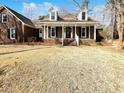 Beautiful brick home with a welcoming front porch, dormer windows and a spacious front yard at 503 Middleton Blvd, Summerville, SC 29485