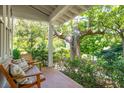 Inviting porch featuring comfortable seating and lush greenery views at 727 Adluh St, Mount Pleasant, SC 29464