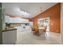 Bright dining area with a table and chairs, located off the kitchen at 101 Clogher Head Way, Goose Creek, SC 29445