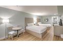 Comfortable hotel bedroom featuring two beds and stylish decor at 1126 Ocean Blvd # 109, Isle of Palms, SC 29451