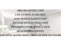 A marketing image that promotes a beachfront hotel unit at 1126 Ocean Blvd # 109, Isle of Palms, SC 29451
