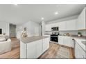 Modern kitchen with stainless steel appliances, granite countertops and a large center island at 207 West Bradford Pointe Dr, Summerville, SC 29486