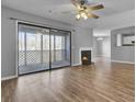Bright living room with fireplace and sliding glass door with great natural light at 208 Greencastle Dr, Goose Creek, SC 29445