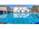 Back of house with a swimming pool for Gathering fun and relaxation during the summer months at 315 Silent Bluff Dr, Summerville, SC 29486