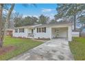 Well-maintained home with carport and ample parking space in a serene neighborhood at 337 Cessna Ave, Charleston, SC 29407