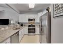 Well-lit kitchen featuring stainless steel appliances, granite countertops and ample cabinet space at 3564 Billings Street St, Mount Pleasant, SC 29466