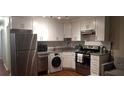 Well-equipped kitchen with stainless steel appliances and ample counter space at 40 Bee St # 309, Charleston, SC 29403