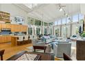 Expansive living area featuring soaring ceilings, abundant natural light, and an open layout perfect for entertaining at 608 W Beach Ct, Folly Beach, SC 29439