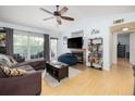 Inviting living room featuring vaulted ceilings, a ceiling fan, and a sliding glass door to the outside at 700 Daniel Ellis Dr # 8304, Charleston, SC 29412