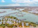 Aerial view of coastal community near ocean inlet and bridges in South Carolina at 1607 Folly Creek Way Way # C-5, Charleston, SC 29412
