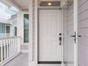 Bright front door with glass storm door offers an abundance of natural light at 1607 Folly Creek Way Way # C-5, Charleston, SC 29412